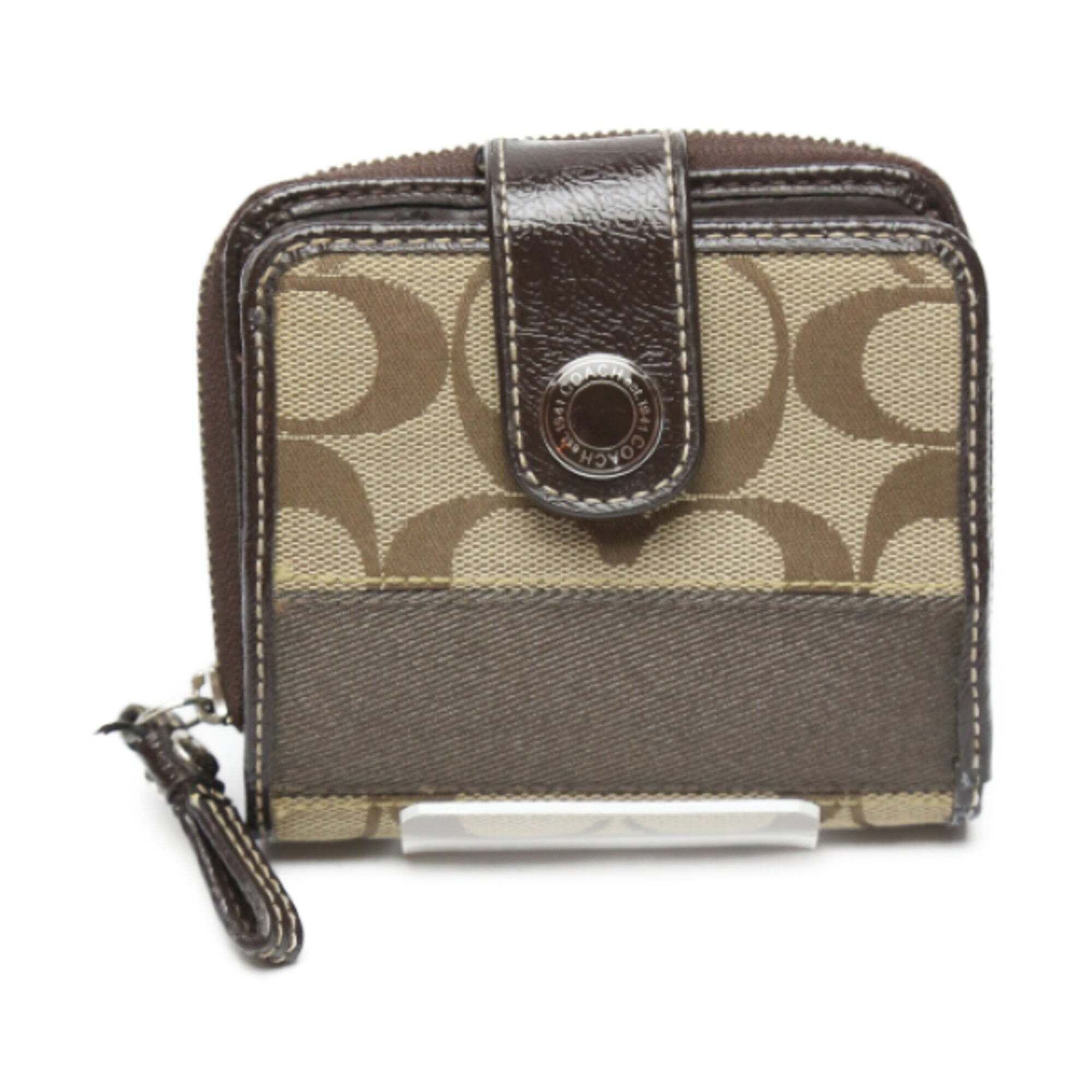 Coach Bifold Wallet In Signature Canvas And Patent Leather With A Round Zippe...